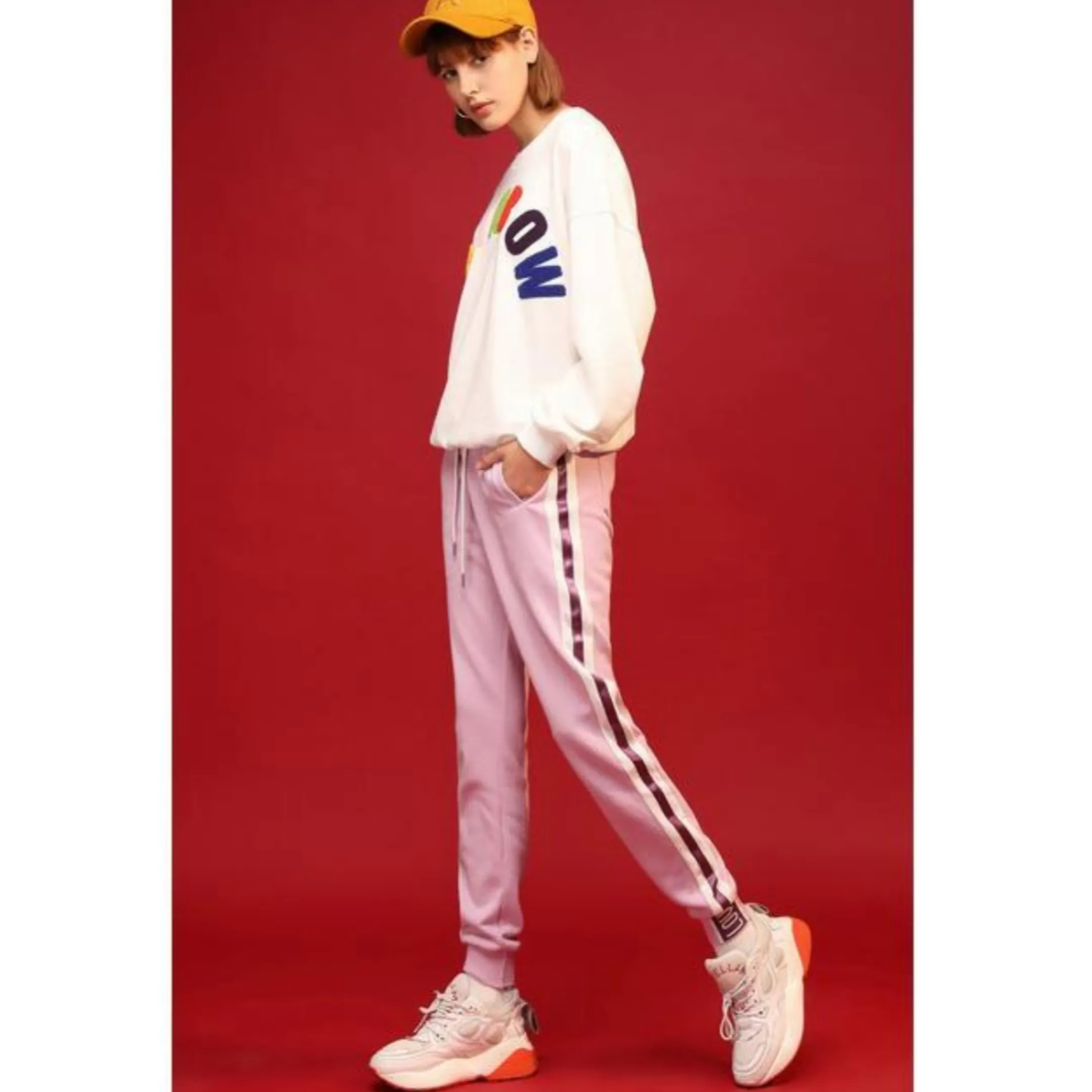 Light purple trackpants with white stripes