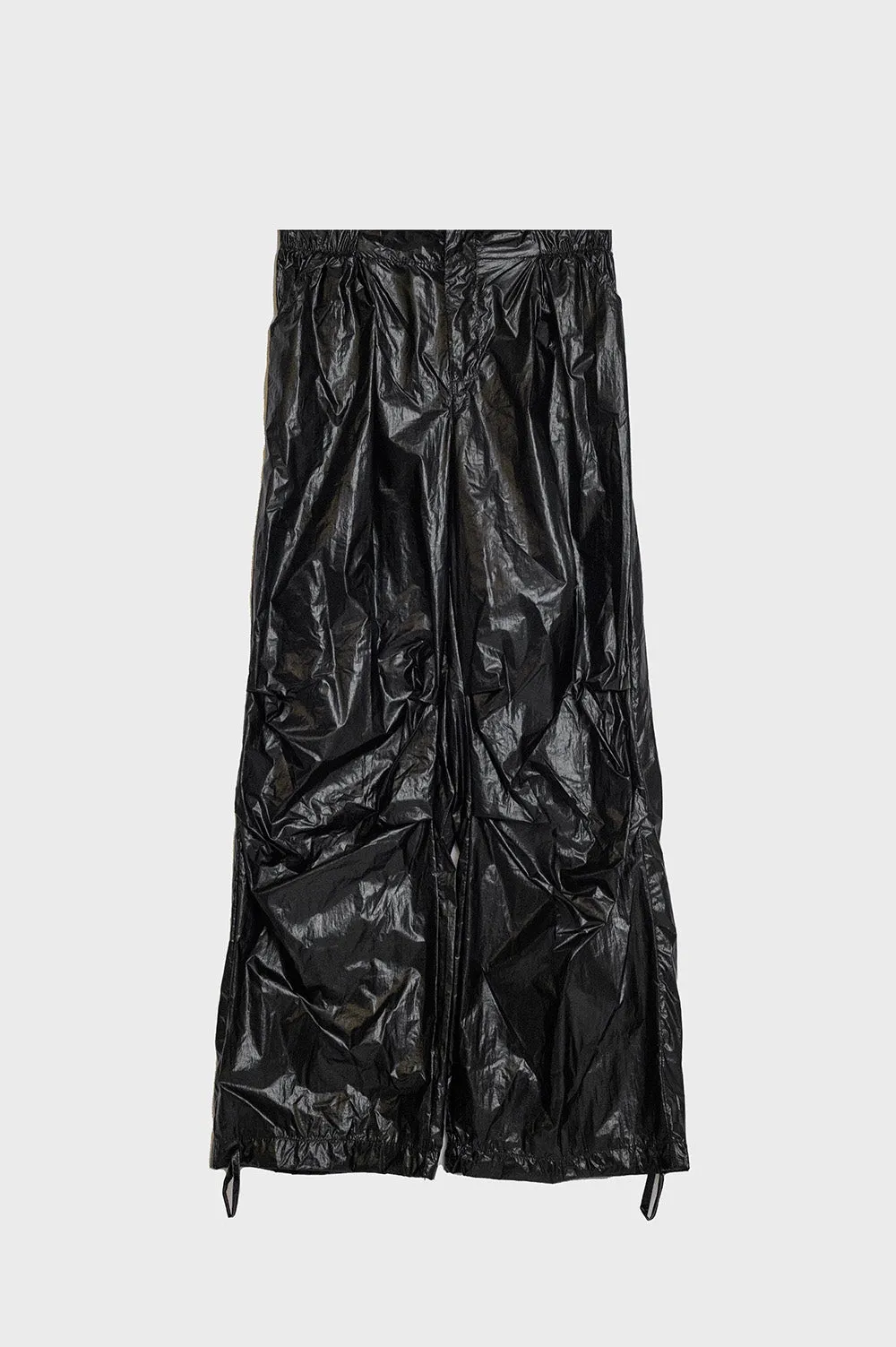 Oversized black parachute metallic pants